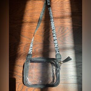 This sporty clear bag is stylish and perfect for going to football games.